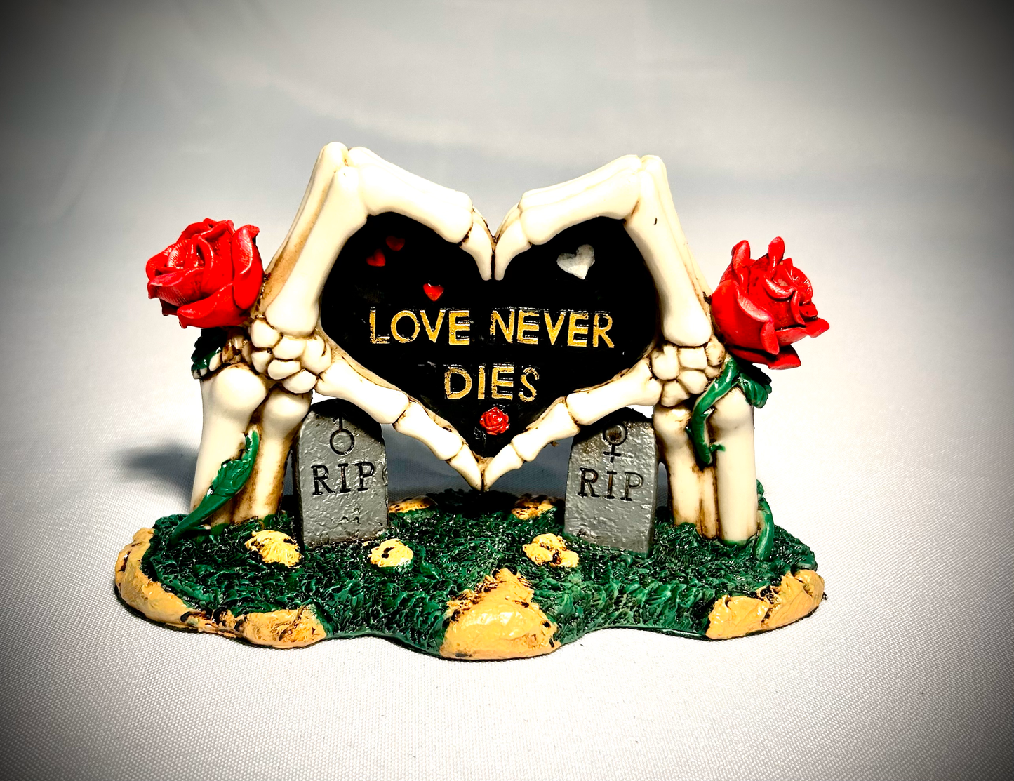 Love Never Dies Skeleton Hand Heart Tombstone